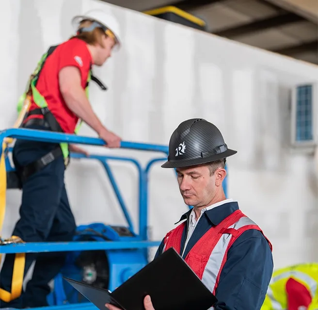A Rainbow Restoration project manager oversees the restoration of a commercial property after a water damage loss in Houston, TX.
