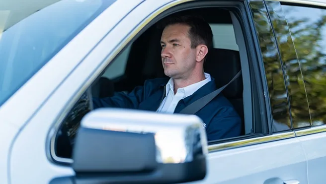 A Rainbow Restoration representative arrives at a commercial property in Grand Rapids, MI, to meet a property owner who has called for help with emergency restoration services.