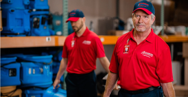 Rainbow Restoration’s emergency response team carries equipment for a water damage loss in Simpsonville, TX.