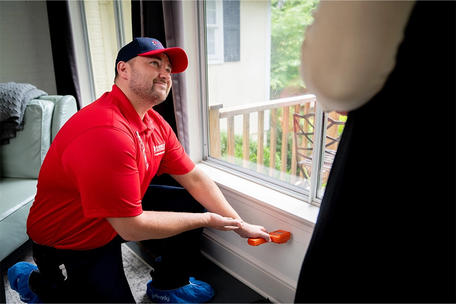 A Rainbow Restoration expert checks for water damage at a Prineville, OR, home.
