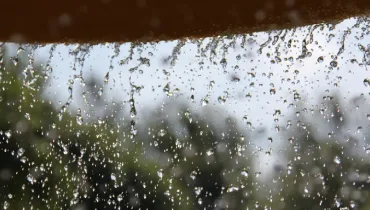 Water droplets falling during heavy rain.