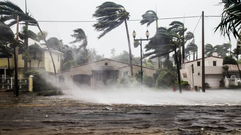 A hurricane breaking land with heavy rains and winds.